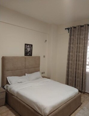 2 quartos, ferros/tábuas de passar roupa, Wi-Fi, roupa de cama