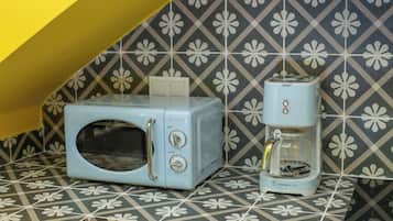 Design Apartment | Private kitchen | Full-size fridge, microwave, oven, stovetop