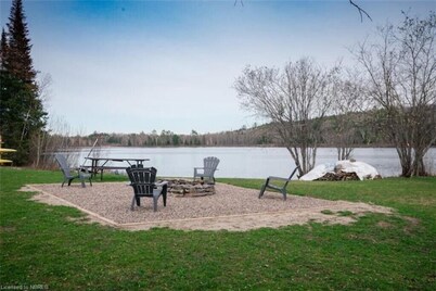 Spacious and Private lakeside cottage retreat with hot tub and games room