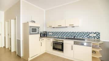 Kondominium | Dapur pribadi | Lemari es, microwave, oven, dan kompor