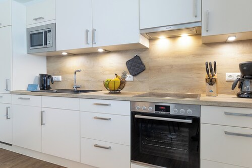 Dorumer Sielhuus 5 – Urlaub am Wasser. Garten. Familienzeit. Ruhig.