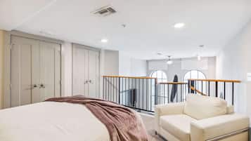 Departamento exclusivo | Ropa de cama de alta calidad y tabla de planchar con plancha