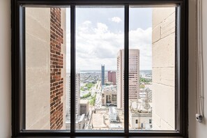 Superior Apartment | Living area | 70-inch TV with digital channels - Distinguished Apartment Rooftop Deck (Baltimore)