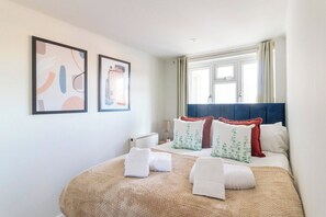 2 dormitorios, tabla de planchar con plancha, wifi y ropa de cama