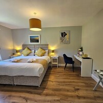 Individually decorated, individually furnished, desk, laptop workspace