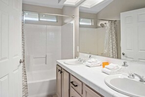 Hair dryer, towels, soap, shampoo