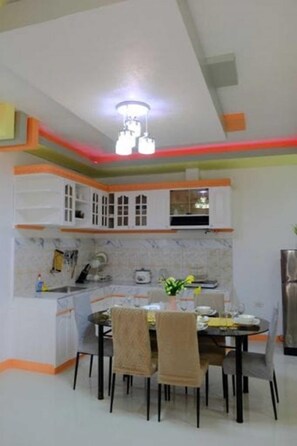 Fridge, stovetop, toaster, cookware/dishes/utensils - Tranquil Retreat: Inviting 2BR Condo in Zamboanga (Zamboanga)