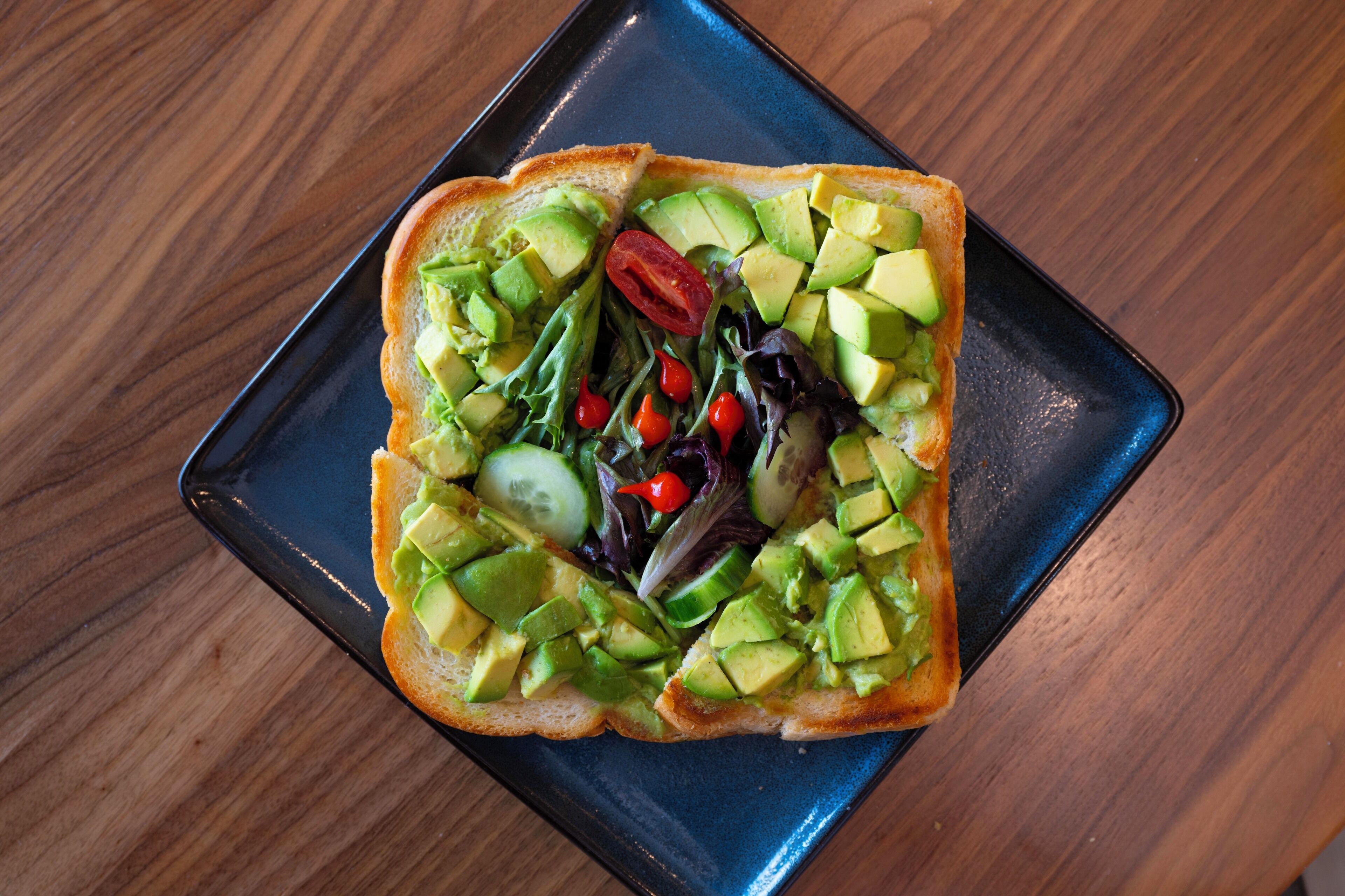 A sandwich on a square plate.