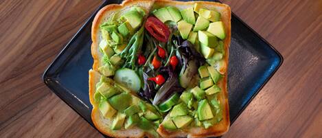 A sandwich on a square plate.