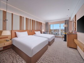 Down comforters, memory foam beds, free minibar, in-room safe