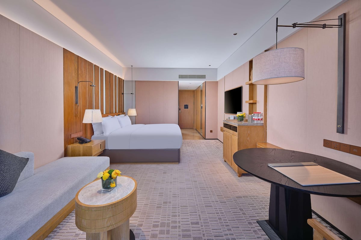 Down comforters, memory foam beds, minibar (free items), in-room safe