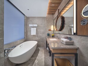 Designer toiletries, hair dryer, bathrobes, towels
