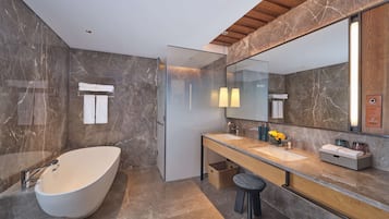 Designer toiletries, hair dryer, bathrobes, towels