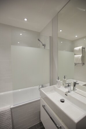 Shower, eco-friendly toiletries, hair dryer, towels