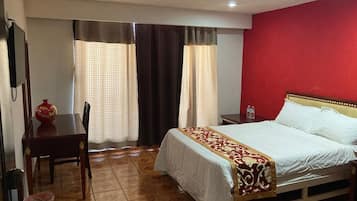 Standard Single Room, City View | 1 bedroom, in-room safe, desk, iron/ironing board
