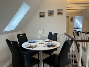 Dining - Vacation apartment Seeherz | Modern feel-good vacation apartment with large roof terrace (Büsum)