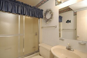Shower, jetted tub, towels