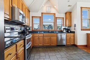 Fridge, microwave, oven, stovetop - Ocean Paradise -- Spacious 7BR Oceanfront with Pool, Hot Tub and More! (Corolla)