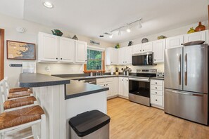 Fridge, microwave, oven, stovetop - Leeward Inn-- Beautifully Decorated Home with Pool, Hot Tub and More! (Southern Shores)