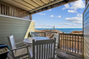 Outdoor dining - Seawalk Unit 8 -- Oceanfront Townhouse with Pool Access (Kill Devil Hills)