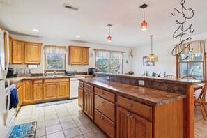 Fridge, microwave, oven, stovetop - Tax D'Ducktion-- 6BR Oceanside home in Downtown Duck with Pool (Duck)