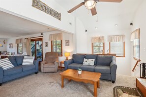 TV, fireplace - Tax D'Ducktion-- 6BR Oceanside home in Downtown Duck with Pool (Duck)