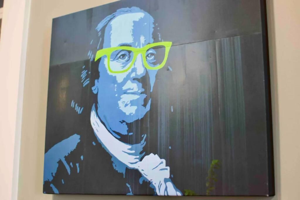 Uma pintura de uma pessoa de óculos.