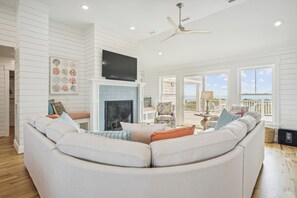 TV, fireplace, stereo - Austin -- New Construction Oceanfront 11BR with Elevator, Fire Pit, Pool, Fitness Room and More! (Corolla)