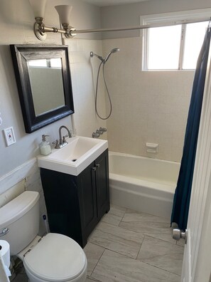 Hair dryer, towels, soap, shampoo