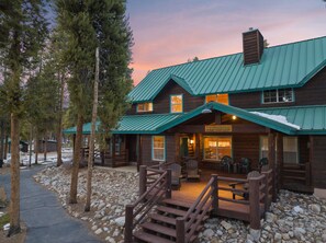 A rustic lodge with a green metal roof, wooden exterior, and a sign reading "Lacawanna." - Lackawanna Lodge- Peaceful, Woodsy, Big Peak Views (Leadville)