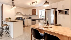 Coffee/tea maker, fridge, microwave, oven