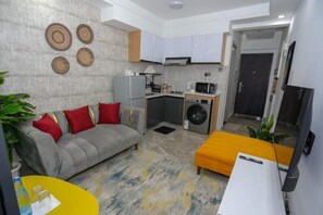 Living area - Cozy Kilimani Apartment with W/machine and Gym (Nairobi)