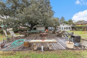 Outdoor dining - Beautiful waterfront home with sunroom, hammock, grill, washer/dryer & AC (San Leon)