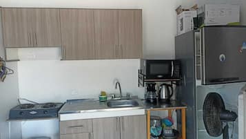 Fridge, microwave, coffee/tea maker, electric kettle