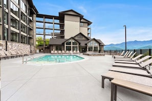 A heated pool - Stylish Modern 3 BR Condo + Views (Gatlinburg)