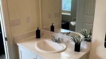 Hair dryer, towels, soap, toilet paper