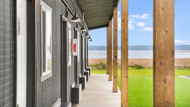 A row of rooms with a view of a lake. - South Bay Inn  (Westport)