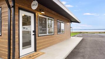 Welcome to the scenic waterfront office with a clear view of the entrance.