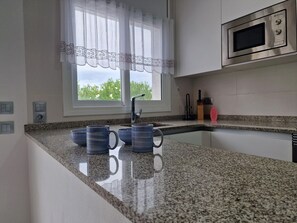 Fridge, microwave, oven, dishwasher - "Del Perro"@MARISOL: 300m to the beach, private pool, A/C, WiFi, dog beach (Riumar)