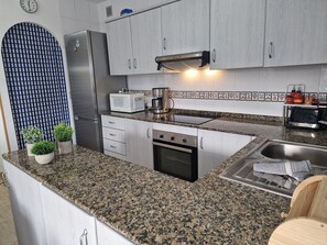 Fridge, microwave, oven, dishwasher