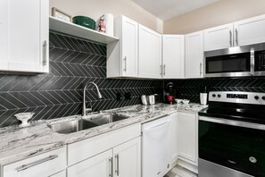 Fridge, microwave, dishwasher, coffee/tea maker