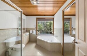 Jetted bath, hair dryer, towels, soap