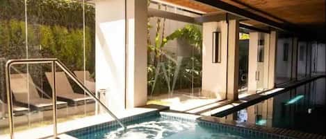 Comfort Studio | Pool | Indoor pool, pool umbrellas, sun loungers