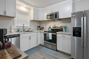 Fridge, microwave, oven, stovetop - Your Newest, Remodeled, and Fully-Furnished AirB&B in the Heart of Fayetteville! (Fayetteville)