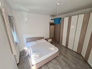 2 bedrooms, desk, iron/ironing board, travel cot