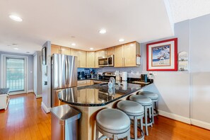 Fridge, microwave, oven, stovetop - Town of Dewey Beach updated condo with pool, balcony, & W/D (Dewey Beach)