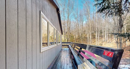 Dog-friendly forest home on 2.6 acres with hot tub, EV charger & woodstove