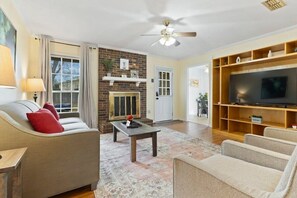 TV, fireplace, offices - Large Fenced Yard near Midtown- Shamrock Stay (Montgomery)