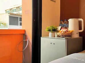 Kamar Mewah | Seprai antialergi, minibar gratis, tirai kedap cahaya, dan Wi-Fi gratis