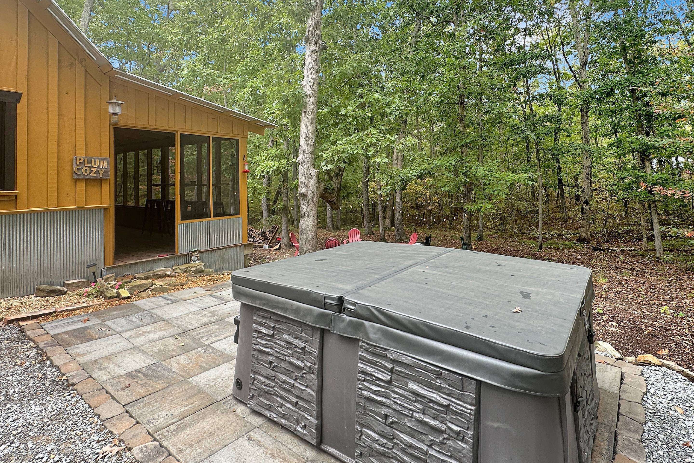 Enjoy an additional hot tub at Plum Cozy
